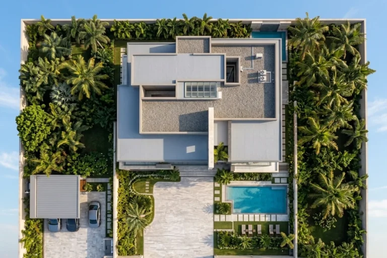 Aerial view of luxury villa with roof, pool, and greenery