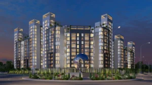 Night view of Globe Residency towers with illuminated blue globe monument in Naya Nazimabad